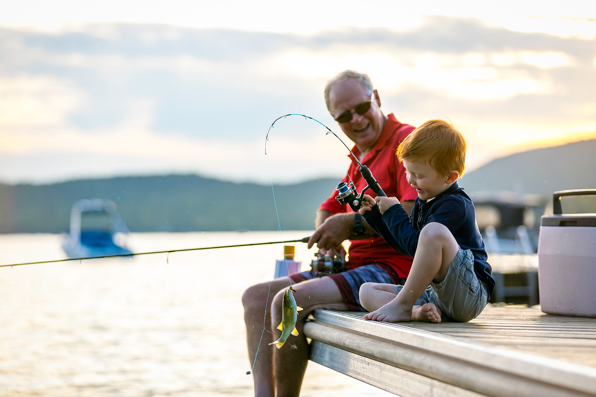 Grandfather and grandson out fishing