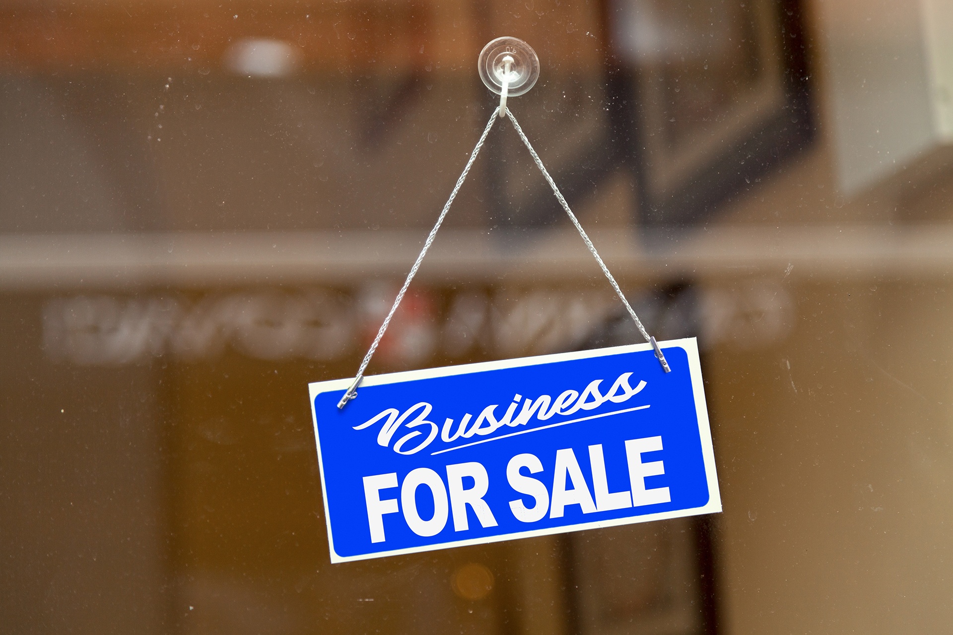 LCG - business for sale sign in the window